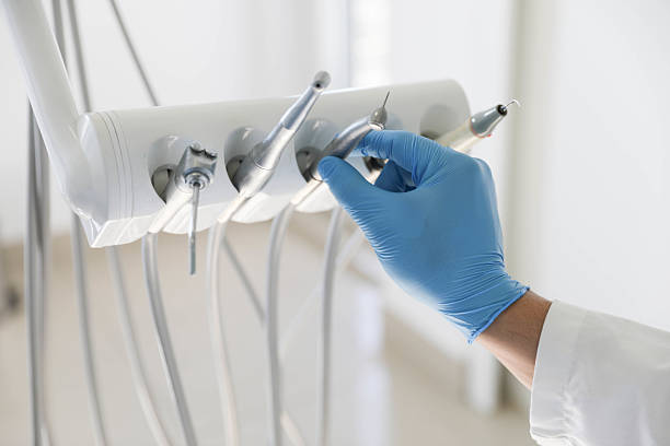 Professional Dental Implants technician working in Central City, IL
